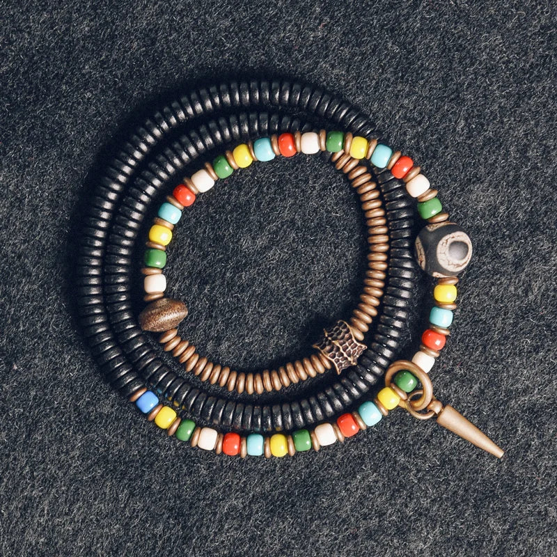 Bracelet Tibétain Perle Dzi, Ébène et Verre Coloré – Vajra en Cuivre Martelé