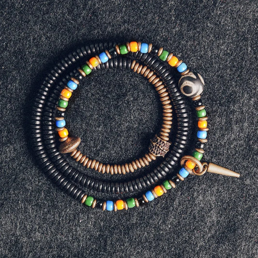 Bracelet Tibétain Perle Dzi, Ébène et Verre Coloré – Vajra en Cuivre Martelé