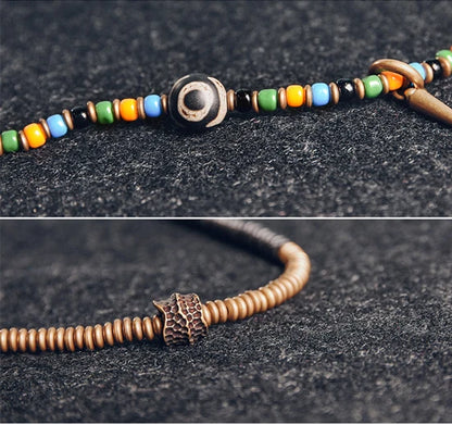 Bracelet Tibétain Perle Dzi, Ébène et Verre Coloré – Vajra en Cuivre Martelé
