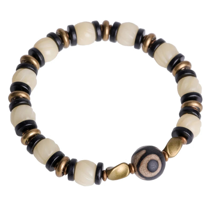 Bracelet de Prière Os Blanc Gravé et Intercalaires en Ébène – Œil Tibétain Protecteur