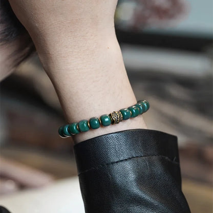 Bracelet Graines de Bodhi Vertes et Laiton – Bijou Zen Porte-Bonheur