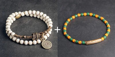 Bracelet Tibétain Multirang Os de Yak et Verre de Murano – Breloque en Laiton Martelé