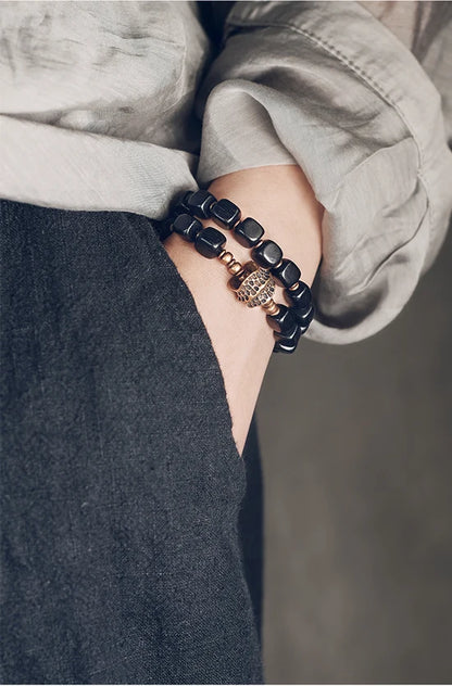 Bracelet Double Rang Ébène et Breloque en Cuivre Martelé Vieilli – Classique Homme et Femme