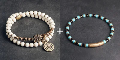 Bracelet Tibétain Multirang Os de Yak et Verre de Murano – Breloque en Laiton Martelé
