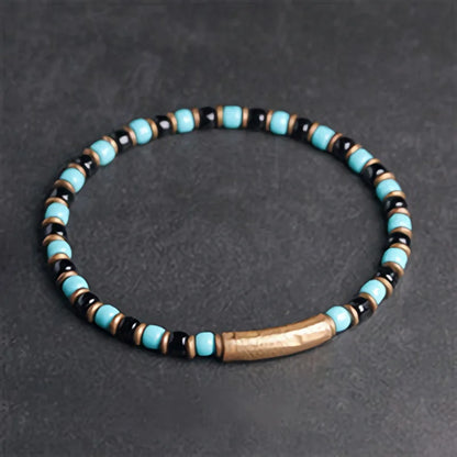 Bracelet Fin Perles de Verre à l'Ancienne et Breloque en Cuivre Martelé – Bohème Chic