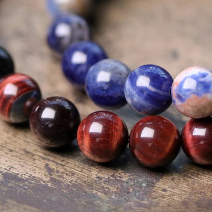 Bracelet Oeil de Tigre Rouge et Obsidienne 8 mm avec Vajra en Cuivre