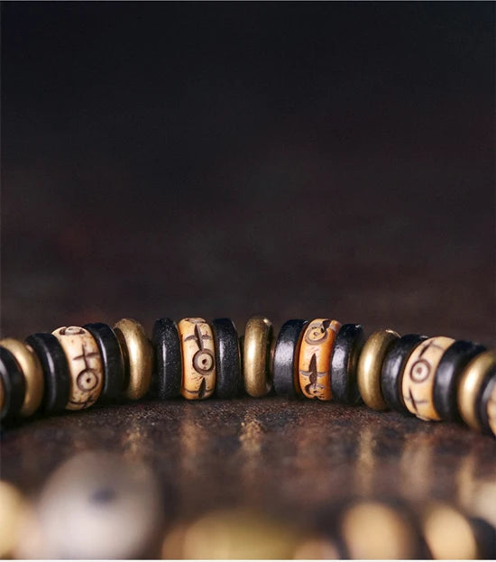 Bracelet Tibétain Os de Bœuf Sculpté et Ébène – Perle Œil Protecteur, Unisexe