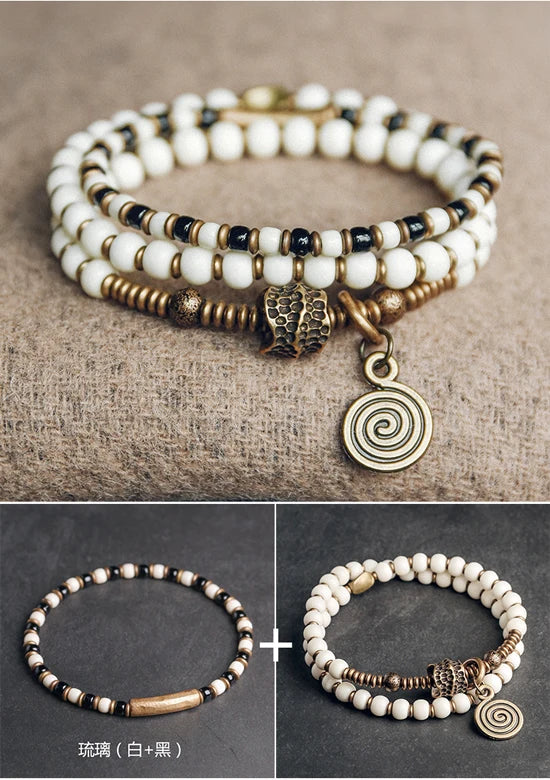 Bracelet Tibétain Multirang Os de Yak et Verre de Murano – Breloque en Laiton Martelé
