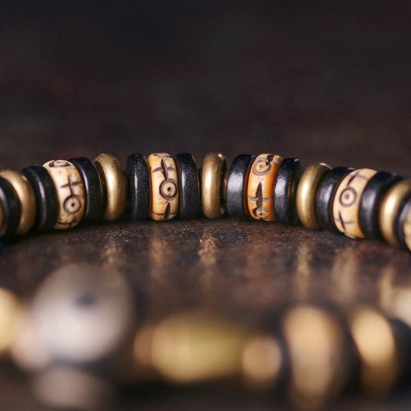 Bracelet Tibétain Os de Bœuf Sculpté et Ébène – Perle Œil Protecteur, Unisexe