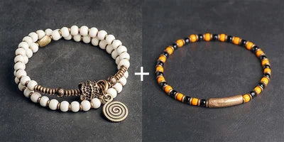 Bracelet Tibétain Multirang Os de Yak et Verre de Murano – Breloque en Laiton Martelé