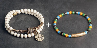 Bracelet Tibétain Multirang Os de Yak et Verre de Murano – Breloque en Laiton Martelé