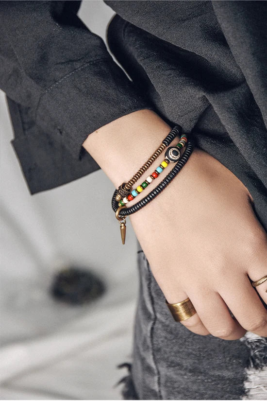 Bracelet Tibétain Perle Dzi, Ébène et Verre Coloré – Vajra en Cuivre Martelé