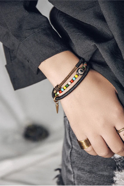 Bracelet Tibétain Perle Dzi, Ébène et Verre Coloré – Vajra en Cuivre Martelé
