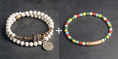 Bracelet Tibétain Multirang Os de Yak et Verre de Murano – Breloque en Laiton Martelé