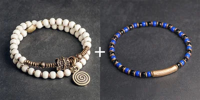Bracelet Tibétain Multirang Os de Yak et Verre de Murano – Breloque en Laiton Martelé