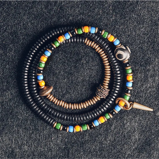 Bracelet Tibétain Perle Dzi, Ébène et Verre Coloré – Vajra en Cuivre Martelé