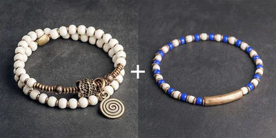 Bracelet Tibétain Multirang Os de Yak et Verre de Murano – Breloque en Laiton Martelé