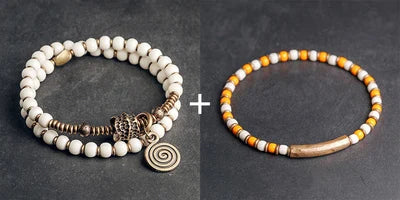 Bracelet Tibétain Multirang Os de Yak et Verre de Murano – Breloque en Laiton Martelé