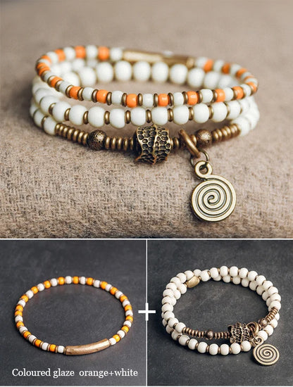 Bracelet Tibétain Multirang Os de Yak et Verre de Murano – Breloque en Laiton Martelé