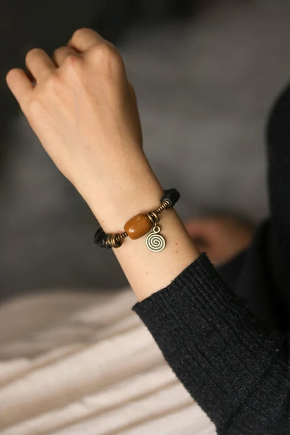 Bracelet Ébène Sculptée à la Main et Cuivre Vintage – Texturé, Anti-Mauvais Œil