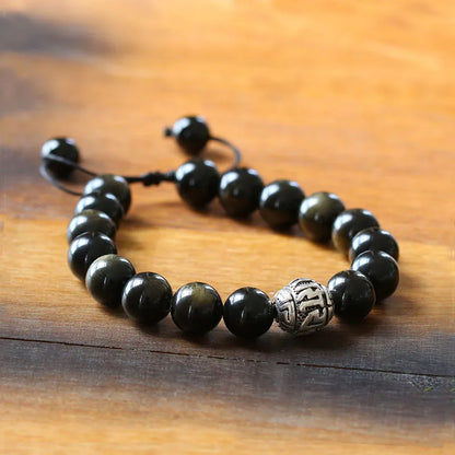 Bracelet Obsidienne Dorée et Breloque Tibétaine OM – Ajustable, pour Homme