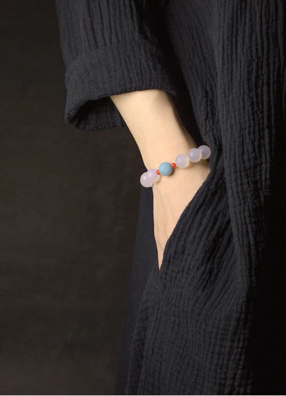Bracelet Agate Blanche ou Grise à Perles Sculptées – Bijou Yoga et Méditation pour Femme