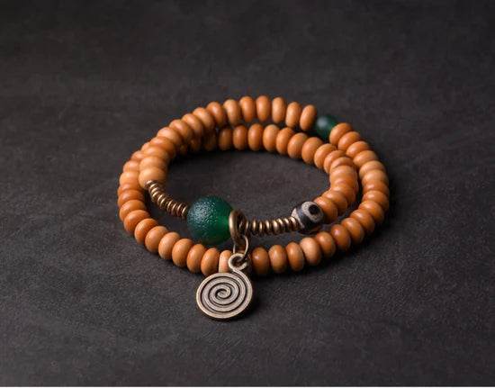 Bracelet Noyaux d'Olive et Onyx Vert avec Perle Œil de Bouddha – Tibétain Écologique