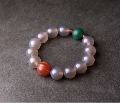 Bracelet Agate Blanche ou Grise à Perles Sculptées – Bijou Yoga et Méditation pour Femme
