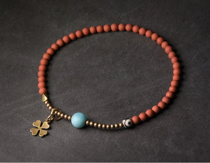 Bracelet Jade Jaune ou Jaspe Rouge avec Breloque Trèfle – Porte-Bonheur pour Femme