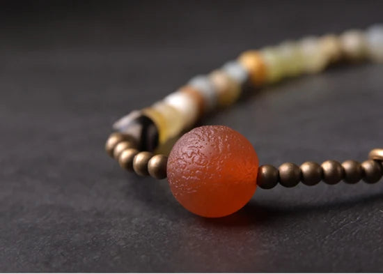 Bracelet Jade Jaune ou Jaspe Rouge avec Breloque Trèfle – Porte-Bonheur pour Femme