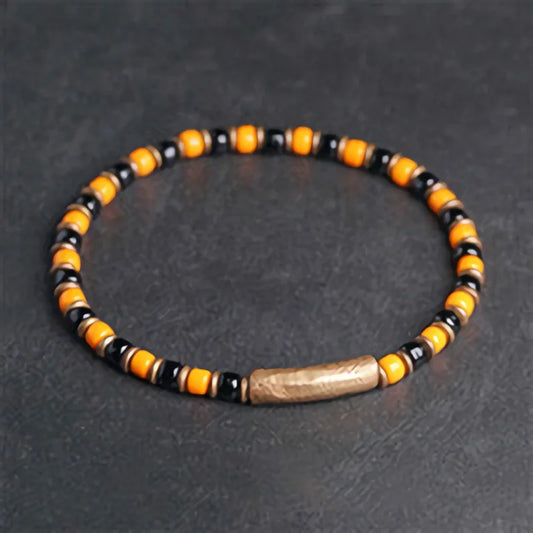 Bracelet Fin Perles de Verre à l'Ancienne et Breloque en Cuivre Martelé – Bohème Chic