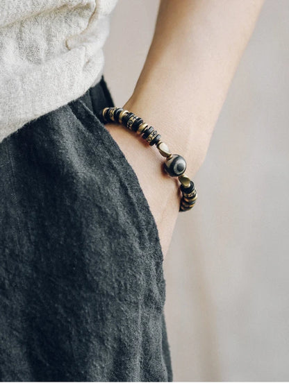 Bracelet Tibétain Os de Bœuf Sculpté et Ébène – Perle Œil Protecteur, Unisexe