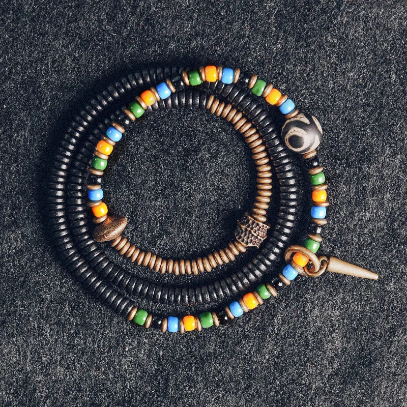 Bracelet Tibétain Perle Dzi, Ébène et Verre Coloré – Vajra en Cuivre Martelé