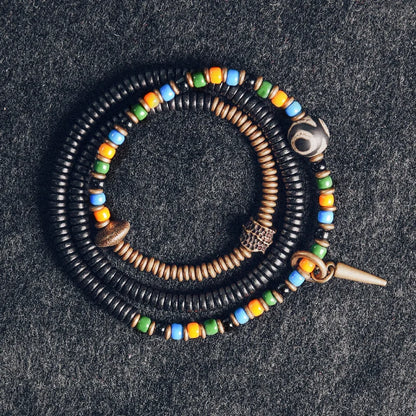 Bracelet Tibétain Perle Dzi, Ébène et Verre Coloré – Vajra en Cuivre Martelé