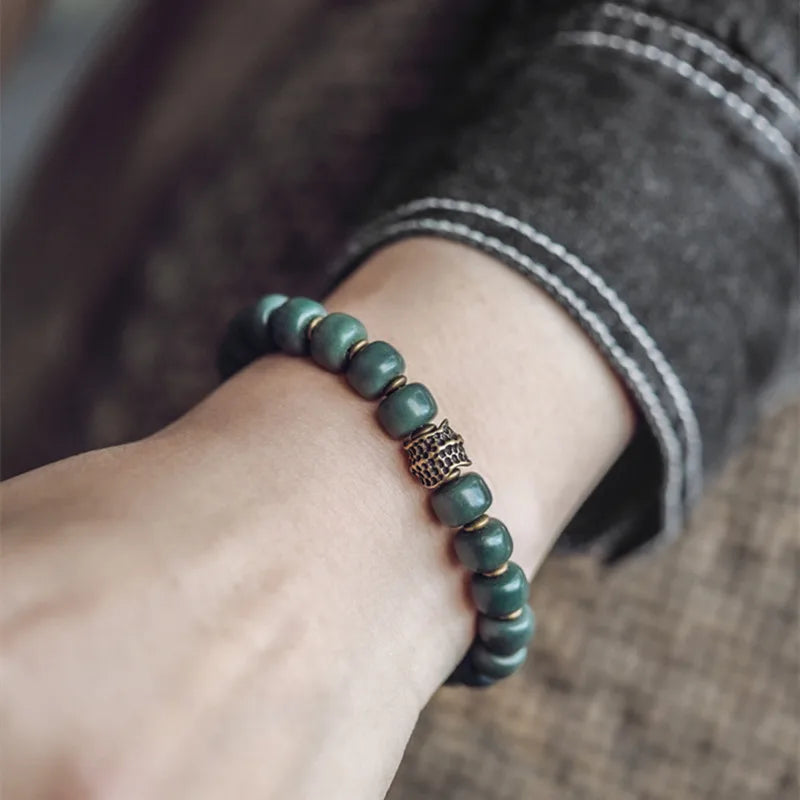 Bracelet Graines de Bodhi Vertes et Laiton – Bijou Zen Porte-Bonheur