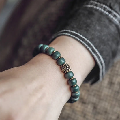 Bracelet Graines de Bodhi Vertes et Laiton – Bijou Zen Porte-Bonheur