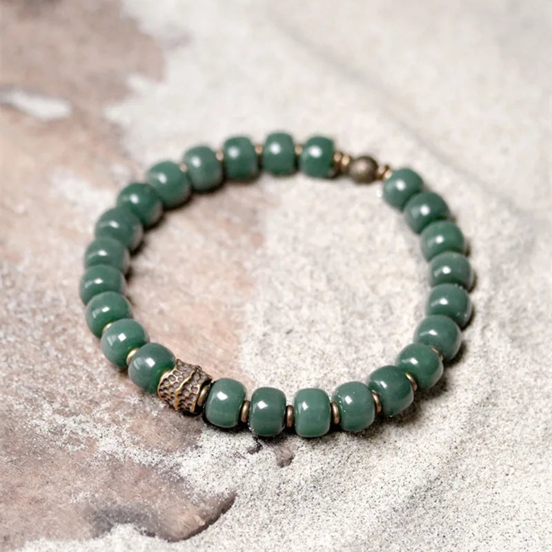 Bracelet Graines de Bodhi Vertes et Laiton – Bijou Zen Porte-Bonheur