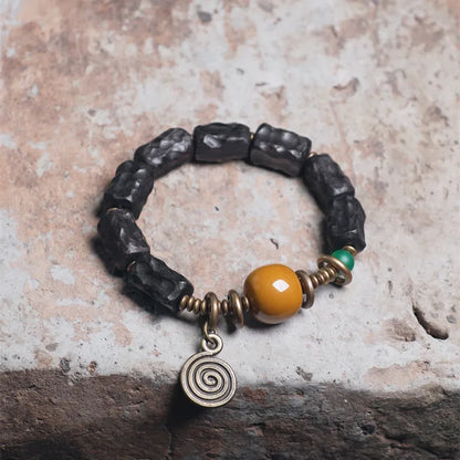 Bracelet Ébène Sculptée et Agate de Gobi – Breloque en Cuivre, Bijou de Couple