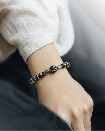 Bracelet Tibétain Os de Bœuf Sculpté et Ébène – Perle Œil Protecteur, Unisexe