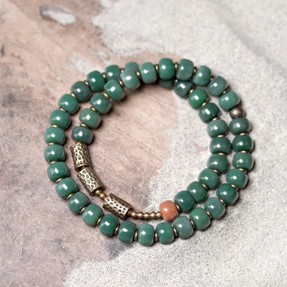 Bracelet Graines de Bodhi Vertes et Breloque en Laiton – Bijou de Méditation pour Femme