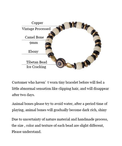 Bracelet de Prière Os Blanc Gravé et Intercalaires en Ébène – Œil Tibétain Protecteur