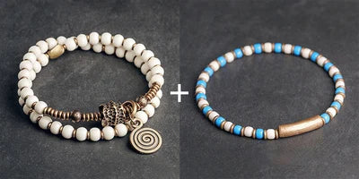 Bracelet Tibétain Multirang Os de Yak et Verre de Murano – Breloque en Laiton Martelé