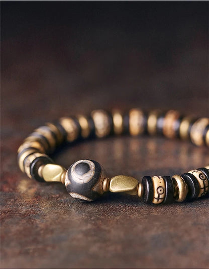 Bracelet Tibétain Os de Bœuf Sculpté et Ébène – Perle Œil Protecteur, Unisexe