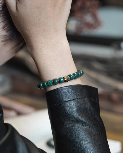 Bracelet Graines de Bodhi Vertes et Laiton – Bijou Zen Porte-Bonheur