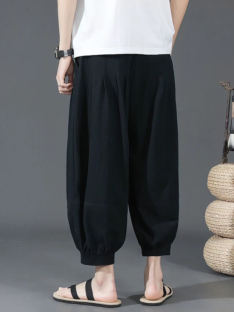 Vue arrière du short sarouel noir pour homme, tissu naturel respirant et taille élastique confortable