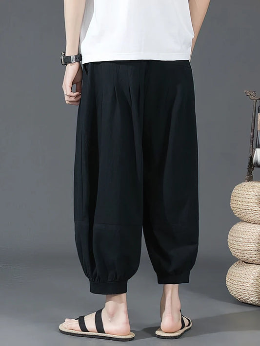 Vue arrière du short sarouel noir pour homme, tissu naturel respirant et taille élastique confortable