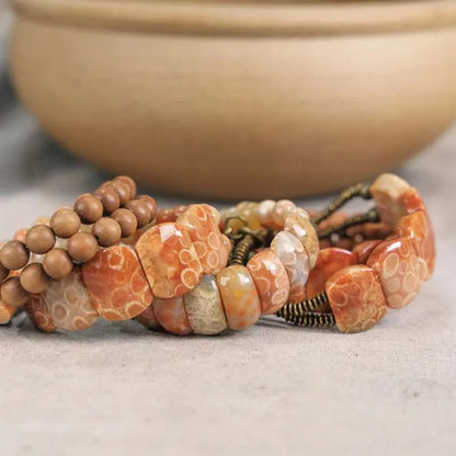 Bracelet Double Rang Pierre Corail et Laiton – Bijou Oriental de Prospérité