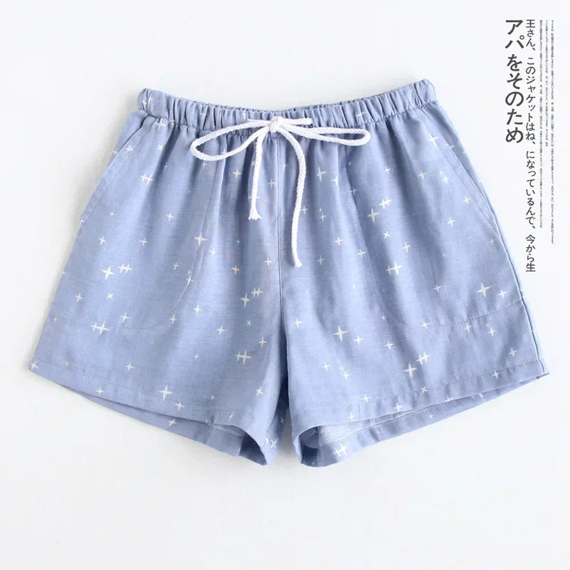 Short de nuit uni en gaze de coton rose poudré, coupe ample et confortable pour l'été.