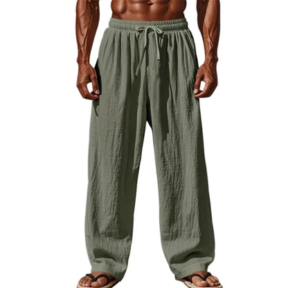 Pantalon homme en lin et coton vert sauge, coupe droite fluide avec taille élastique et cordon.