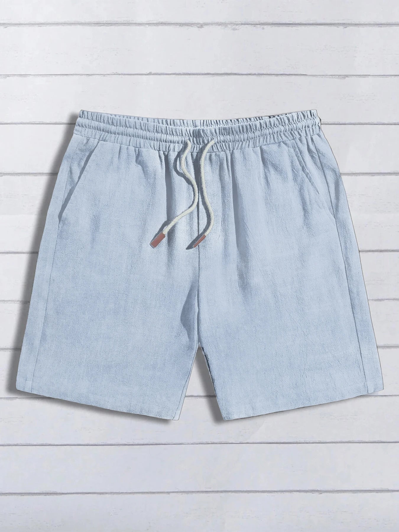 Short homme en lin et coton bleu marine, une alternative élégante pour l'été.